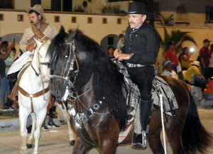 Horse and caballero with silver saddle